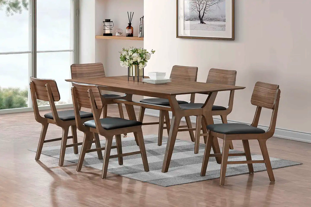 Walker walnut side chairs with black seats around the Walker dining table