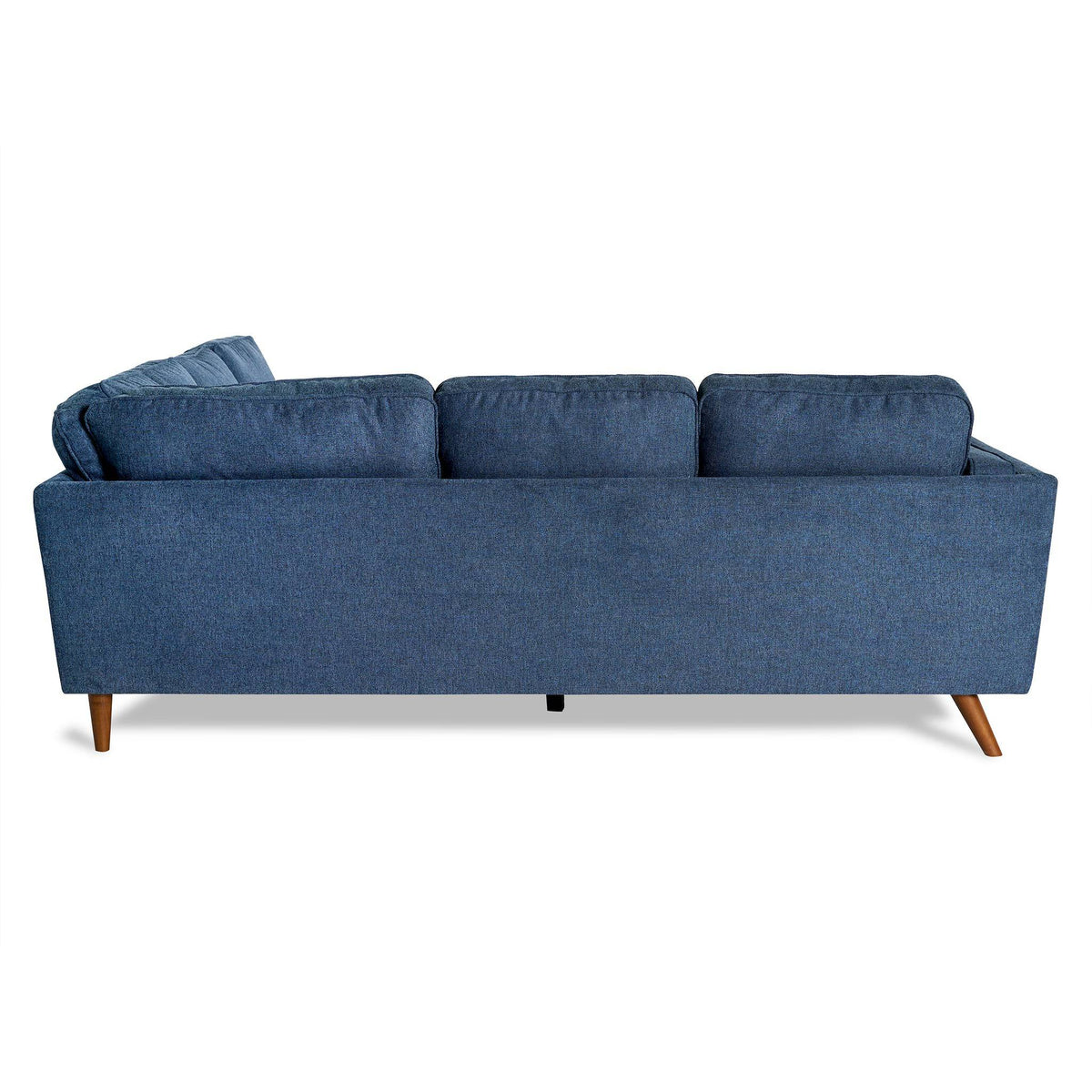The living room features the Maddox sectional, a mid-century modern piece with three back cushions and angled wooden legs, all in blue and set against a white backdrop.