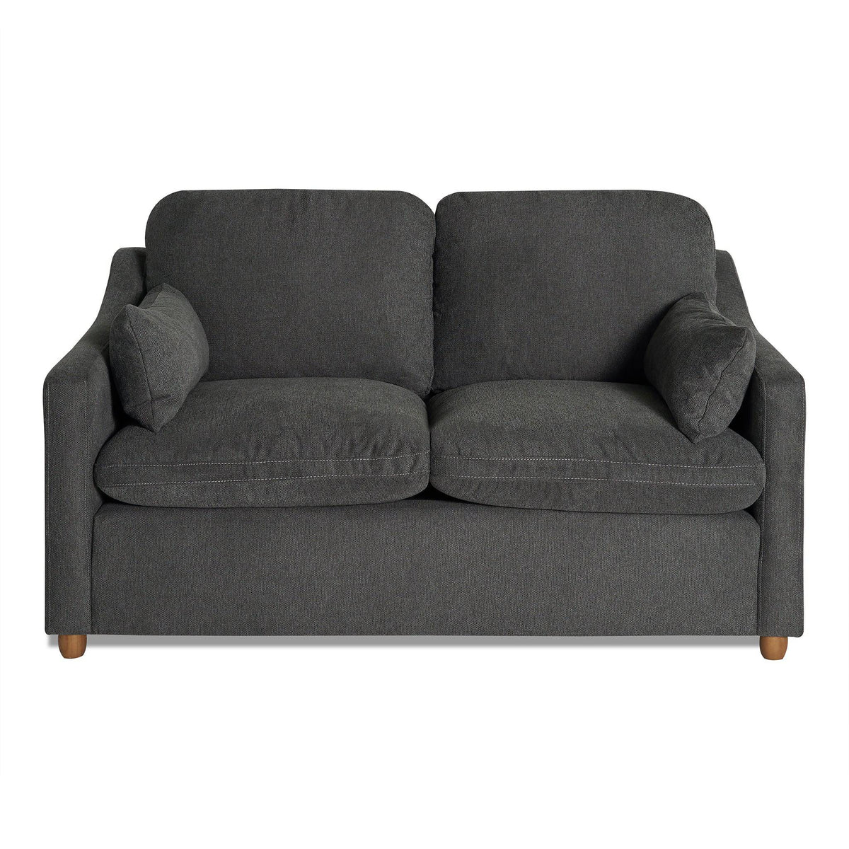 My Cloud Slope Loveseat in Classic Gray staged in a modern urban loft at dusk