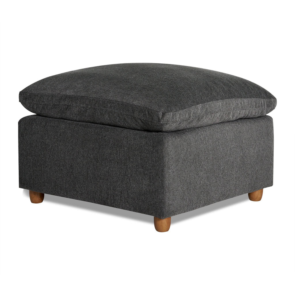 The My Cloud Slope 30 Ottoman features a plush gray upholstered cushion and small wooden legs. Its simple, modern design complements various home decor styles, offering both comfort and customizable furniture options for your living space.