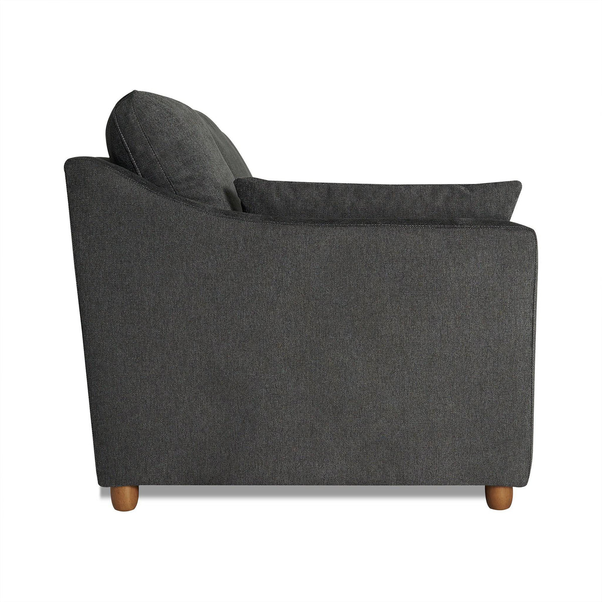 Side view of the My Cloud Slope Sofa in dark gray, showcasing a cushioned backrest and seat. This customizable piece features a clean, modern design with machine-washable covers and small round wooden legs.