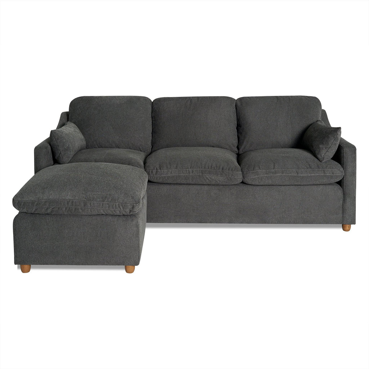 The My Cloud Slope Sofa is a dark gray L-shaped sectional with three cushions, a left chaise, wooden legs, and matching armrest cushions. It features machine-washable covers and offers a modern, plush appearance.
