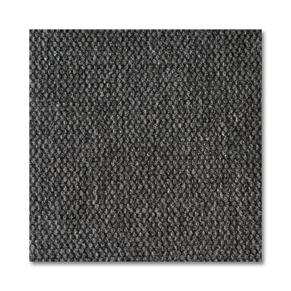 Close-up of a textured dark gray fabric square on the My Cloud Slope 40 Ottoman, showing a tight weave pattern. Shadows highlight small, repetitive loops, adding depth and durability.