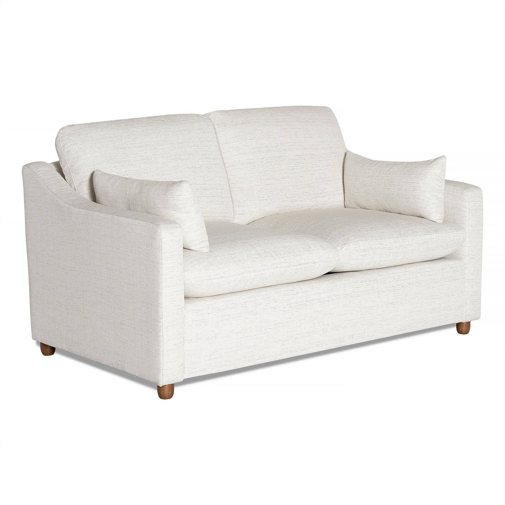Discover the My Cloud Slope Loveseat, a sleek white design with plush cushions and matching side pillows. This customizable piece boasts a minimalist style with angled arms and robust wooden legs, ideal for modern living rooms.