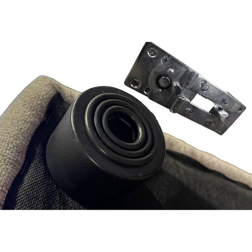 A close-up shows an Alligator Locks black rubber caster wheel with a nearby rectangular metal bracket. The wheel is attached to a fabric-covered item, perhaps furniture. The metal bracket features screw holes and a central cut-out for secure mounting.