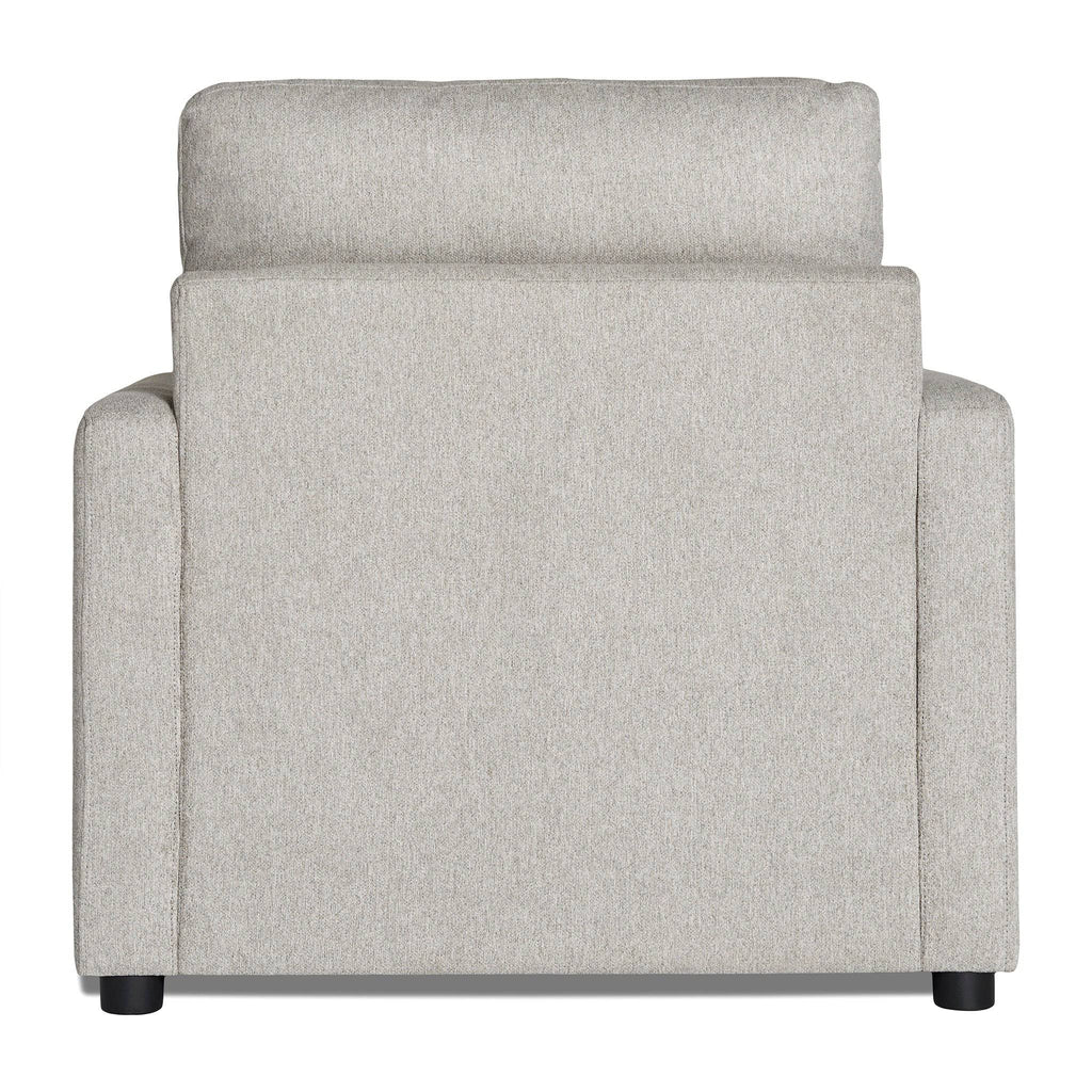 The My Cloud Chair features light gray upholstery with a plush cushion and sleek, modern design. Its straight lines and simple dark base make it the epitome of comfort, ideal for contemporary interiors.