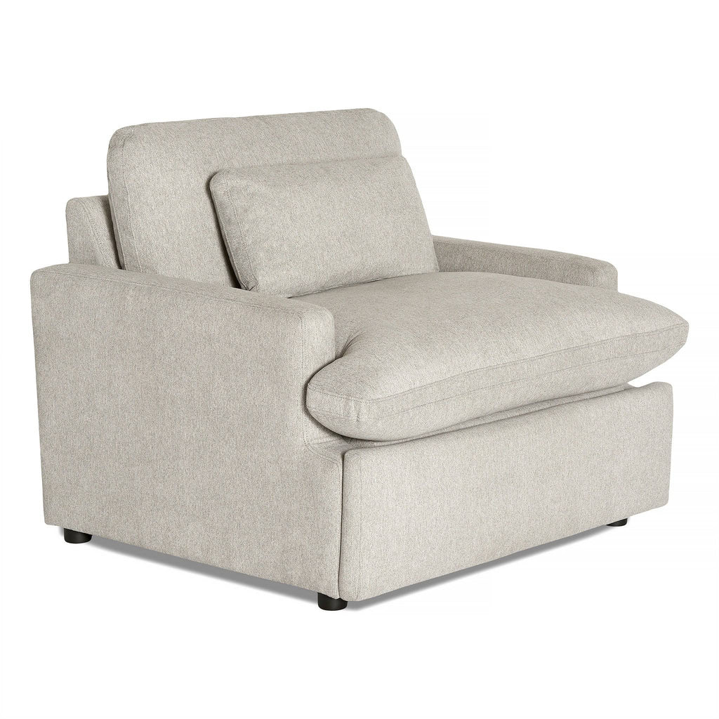 The My Cloud Power Recliner is a modern gray armchair featuring plush cushions and a minimalist design. Its boxy shape, single back cushion, sleek armrests, and small black feet promise both style and relaxation.