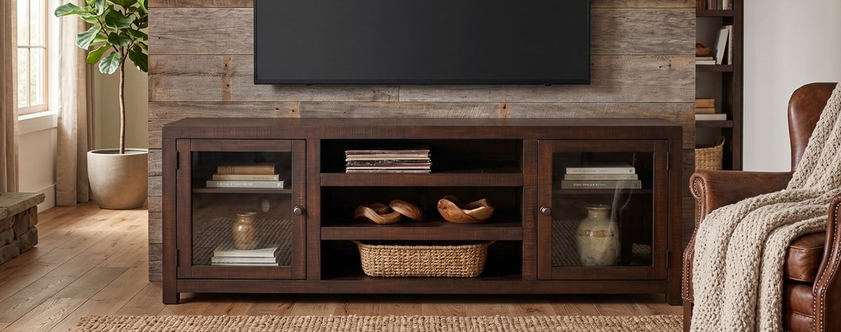 72 inch Homestead media console staged under a TV in a rustic living room