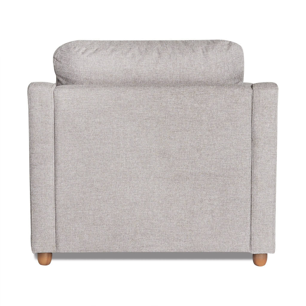 The image shows the back of the My Cloud Slope Chair, a light gray upholstered armchair with wooden legs. Set against a white background, its textured fabric, cushioned backrest, and armrests reflect customizable furniture design and offer an inviting comfort.