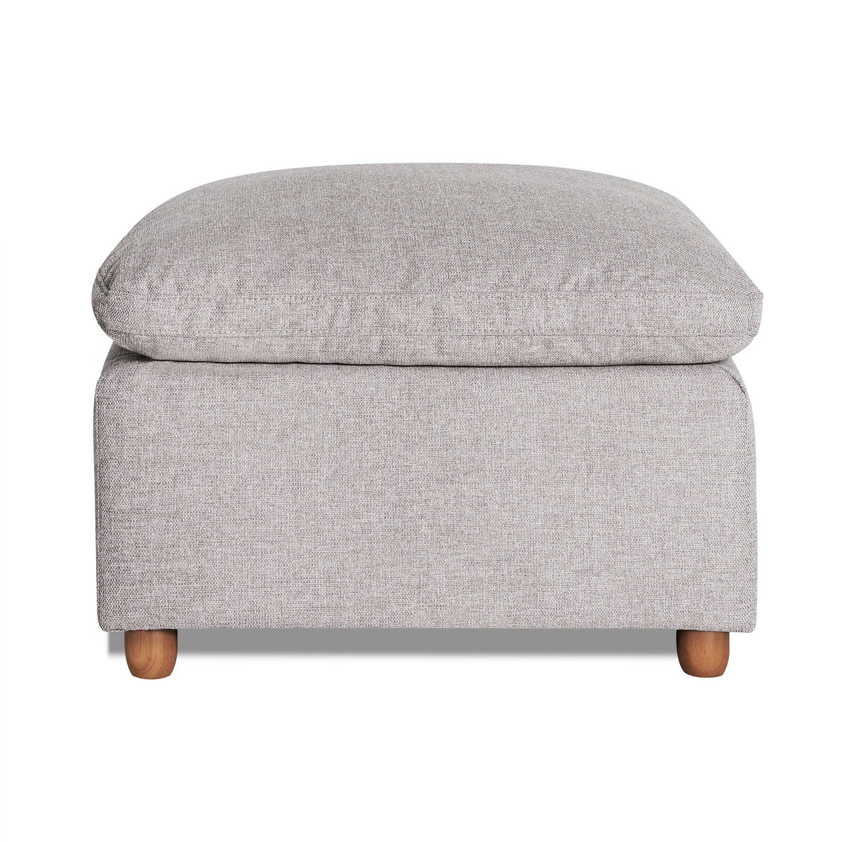 The My Cloud Slope 30 Ottoman in gray features a cushioned top and wooden legs, offering a blend of comfort and modern design. Its textured fabric enhances both style and comfort.