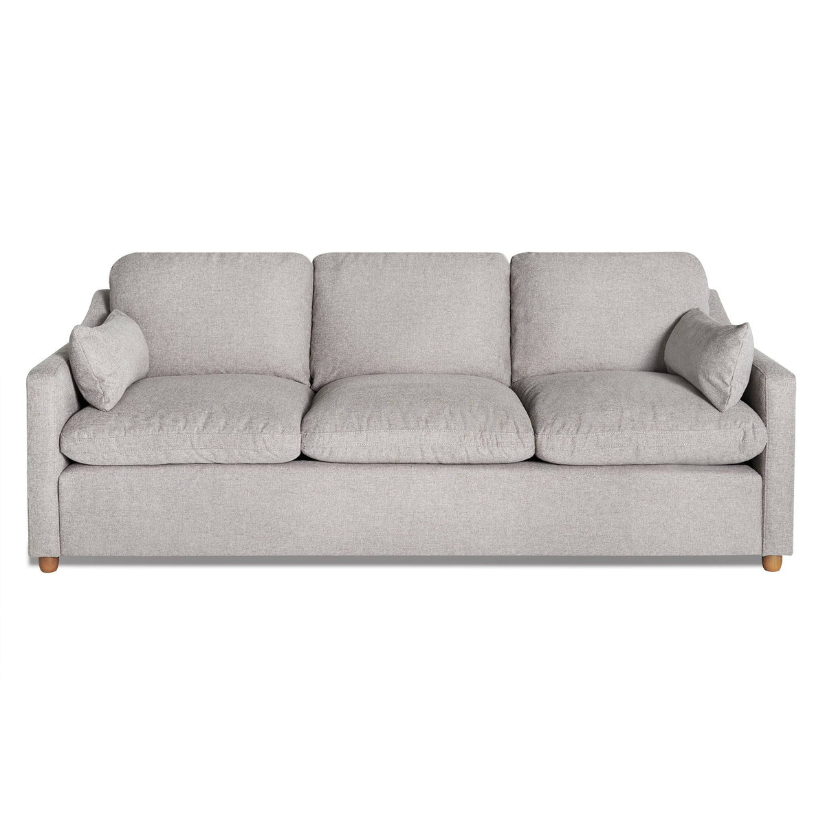 The My Cloud Slope Sofa is a sophisticated light gray three-seater with three seat and back cushions, square armrests, and two matching accent pillows. It sits gracefully on wooden legs, with machine-washable covers ensuring easy maintenance for this customizable piece of furniture.