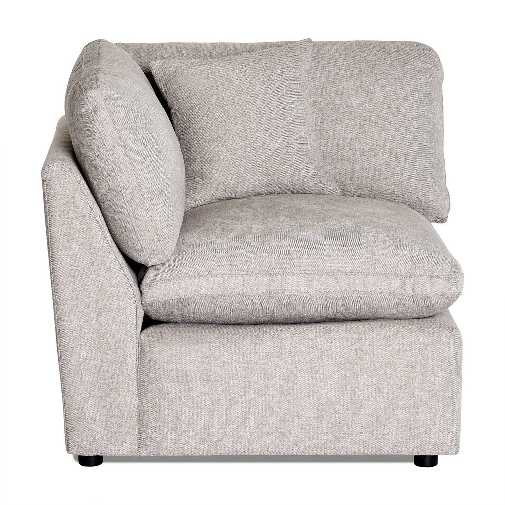 The My Cloud Slope Corner is a light gray sectional with a minimalist design, plush upholstery, straight lines, and square seating. It includes two cushions and suits modern interiors perfectly. Positioned against a white background, its versatility shines through.