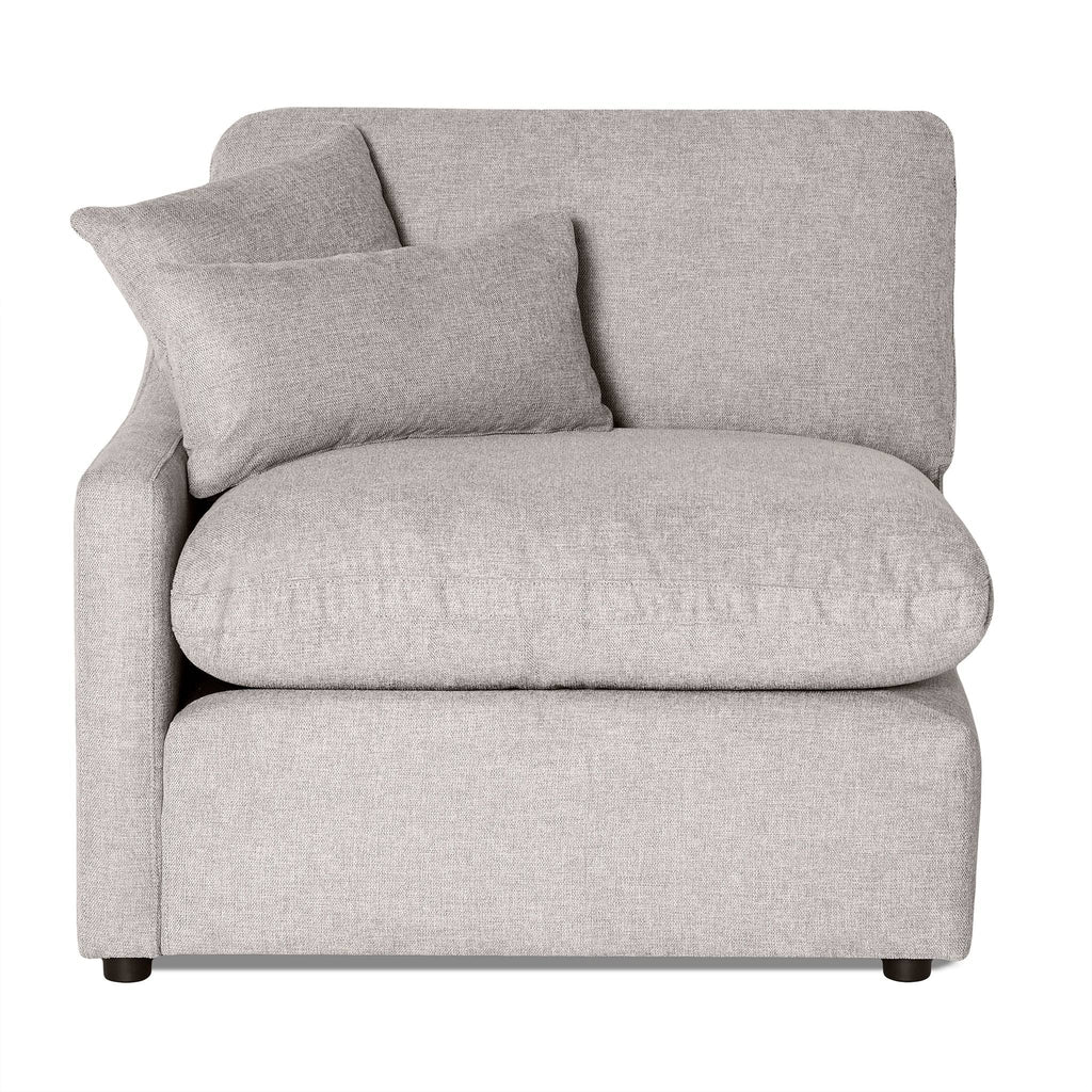 The My Cloud Slope Left Arm in gray fabric enhances your living space with its thick cushioned seat and backrest. This modular piece features an angled pillow against the backrest, a simple modern design, and short black legs.