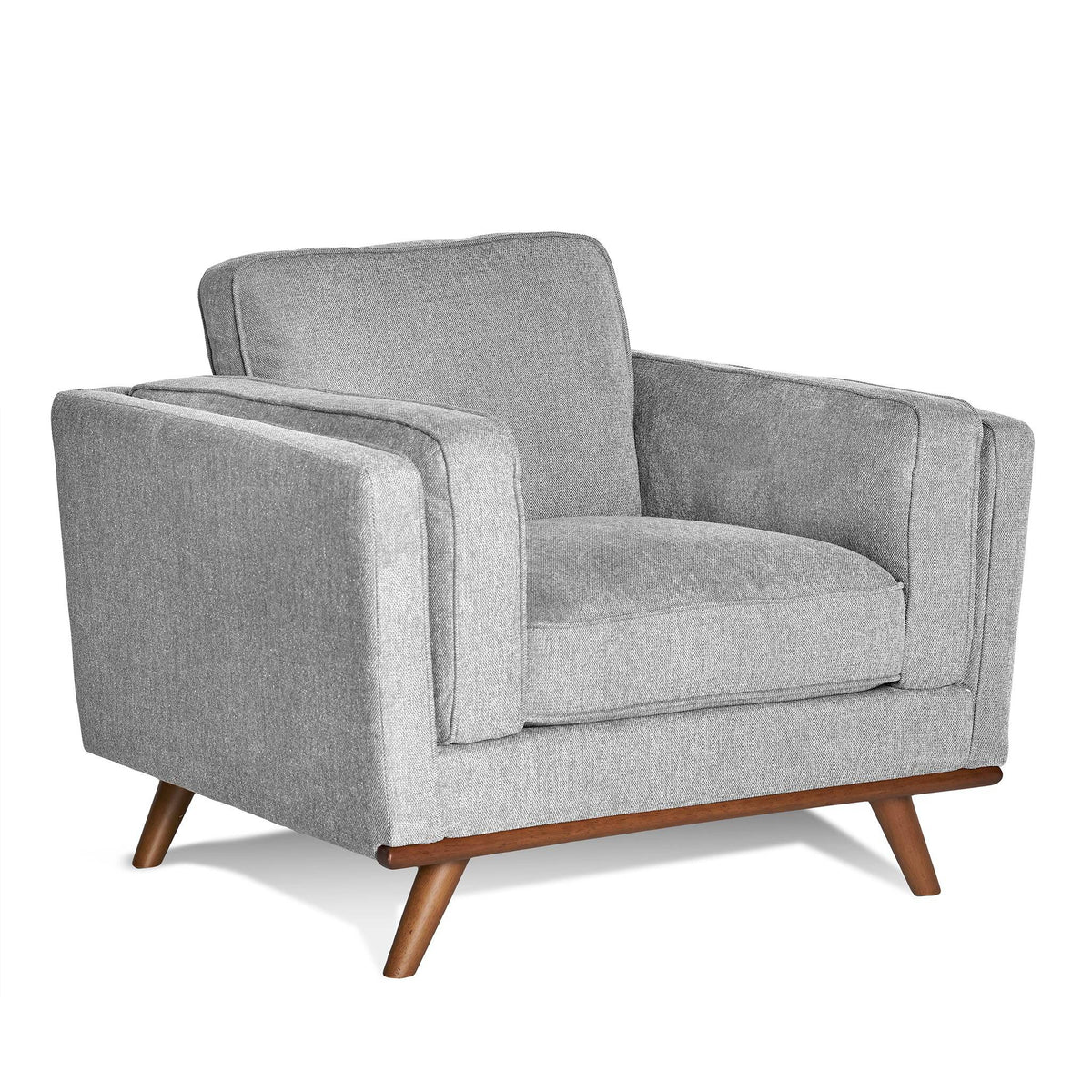 The Maddox Chair is a modern grey armchair with a boxy design, plush seat and back cushions, clean lines, and wooden tapered legs. It adds mid-century modern style that perfectly complements the Maddox Sofa Set.