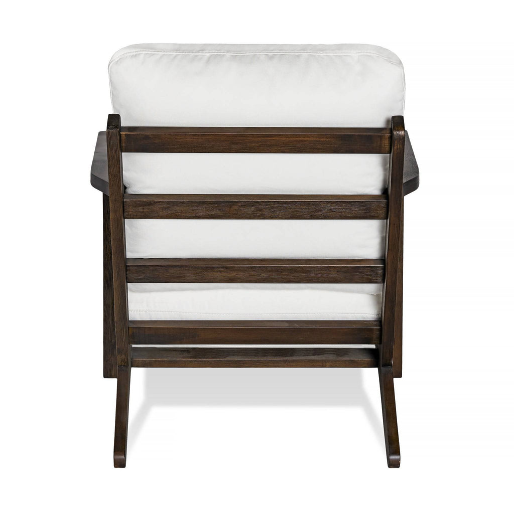 The Peyton Chair boasts a slatted back and cushioned seat in mid-century style. With a white cushion, dark wood finish, and slightly angled legs, its both comfortable and stylish when viewed from behind.