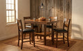Pendleton 5-piece pub set staged in a warm dining nook