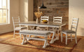 The Whispering Birch dining collection staged in a warm dining room