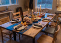 Live edge river dining table set for a dinner party