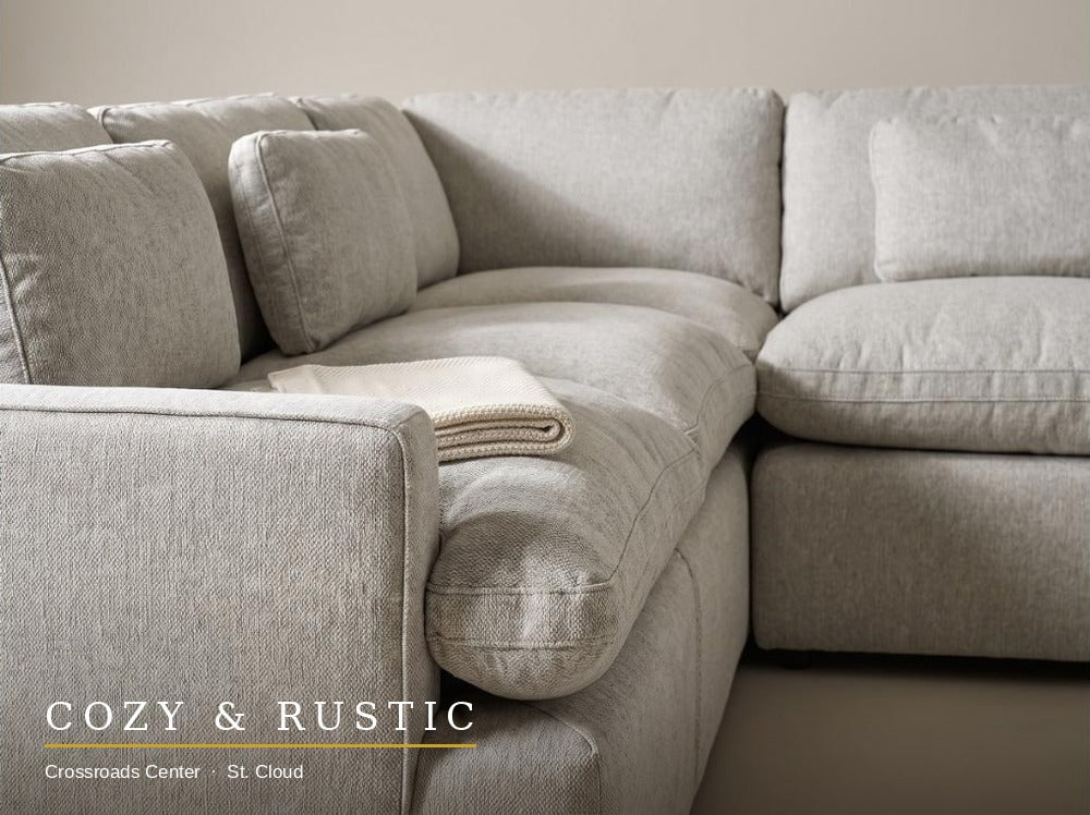 My Cloud 5 Piece L sectional in Greige fabric texture and cushion seam detail with folded throw blanket for scale