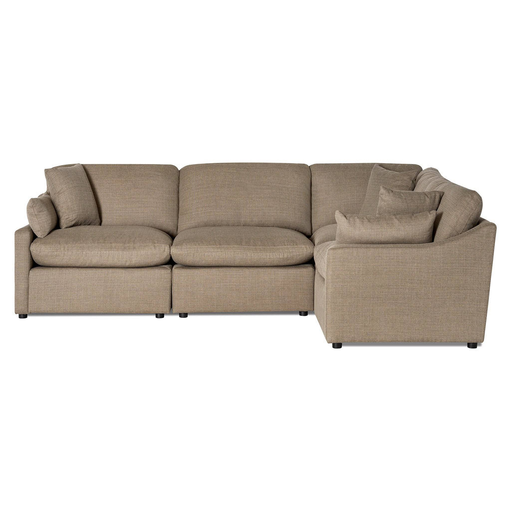 The My Cloud / Slope Arm is a beige L-shaped sectional sofa with cushioned seating and backrest, featuring slightly textured fabric. It includes matching throw pillows for a cozy, modern look.