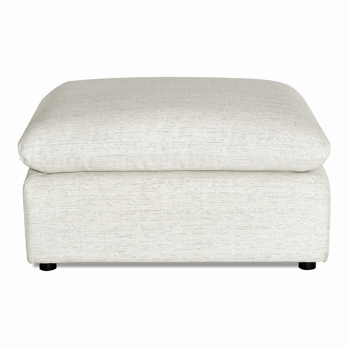 The My Cloud Slope Armless ottoman features a square, cushioned design with a light beige fabric cover and short dark legs. Its modern simplicity makes it an inviting addition to any seating arrangement, perfect for enhancing your living room decor.