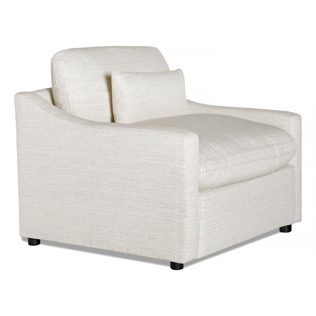 The My Cloud Slope Power Recliner is a modern, off-white armchair with a plush seat and backrest, complemented by a matching throw pillow. It rests on small dark wooden legs and features slightly curved arms, offering customizable options for a minimalist and cozy look.