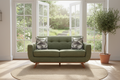 Cortona loveseat in green, staged by garden doors