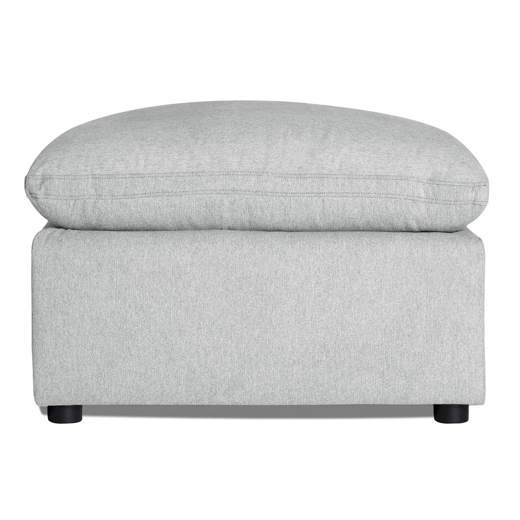My Cloud 30 inch Ottoman in Greige staged in a cozy living room with matching sofa