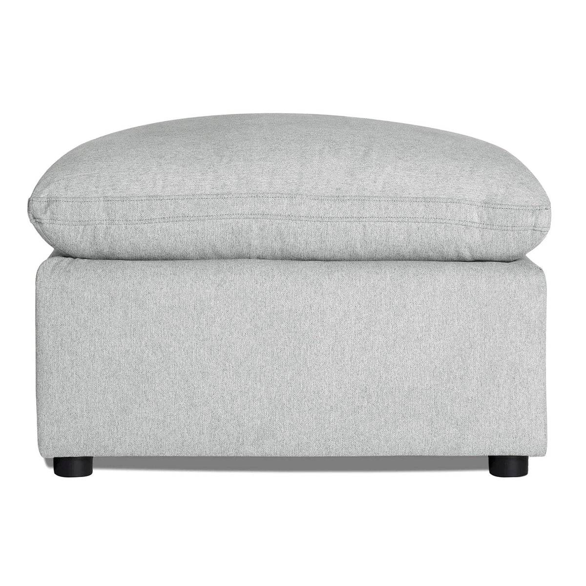 My Cloud 30 inch Ottoman in Greige staged in a cozy living room with matching sofa