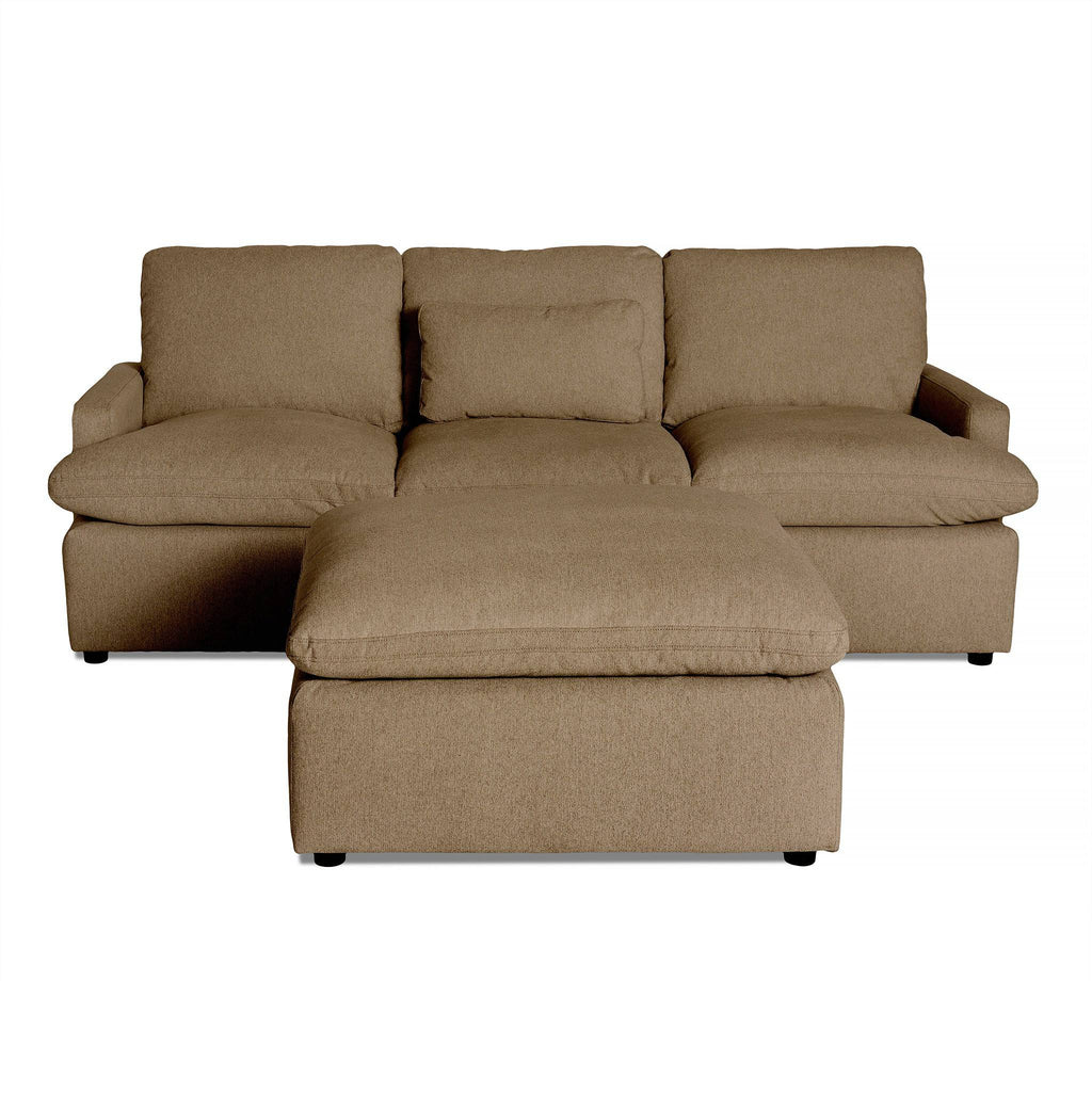 The My Cloud Sofa, a brown three-seater, includes a matching ottoman. With plush cushions for seating and backrest, it offers customizable comfort and a modern look. The ottoman doubles as a footrest and extra seating.