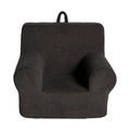 The My Cloud Kidz Chair is a dark gray childrens armchair with a soft Sherpa cover, curved armrests, and a sturdy backrest. Designed for convenience, it includes a loop handle for easy portability, ensuring its both stylish and functional in your little ones space.