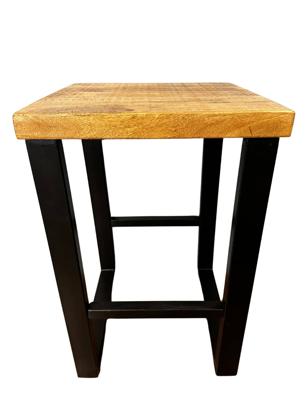 The Mango Stool is a small, square accent piece crafted from sustainable mango wood with black metal legs. Its minimalist design features a simple crossbar for support, and the natural wood finish beautifully complements its sleek modern aesthetic.