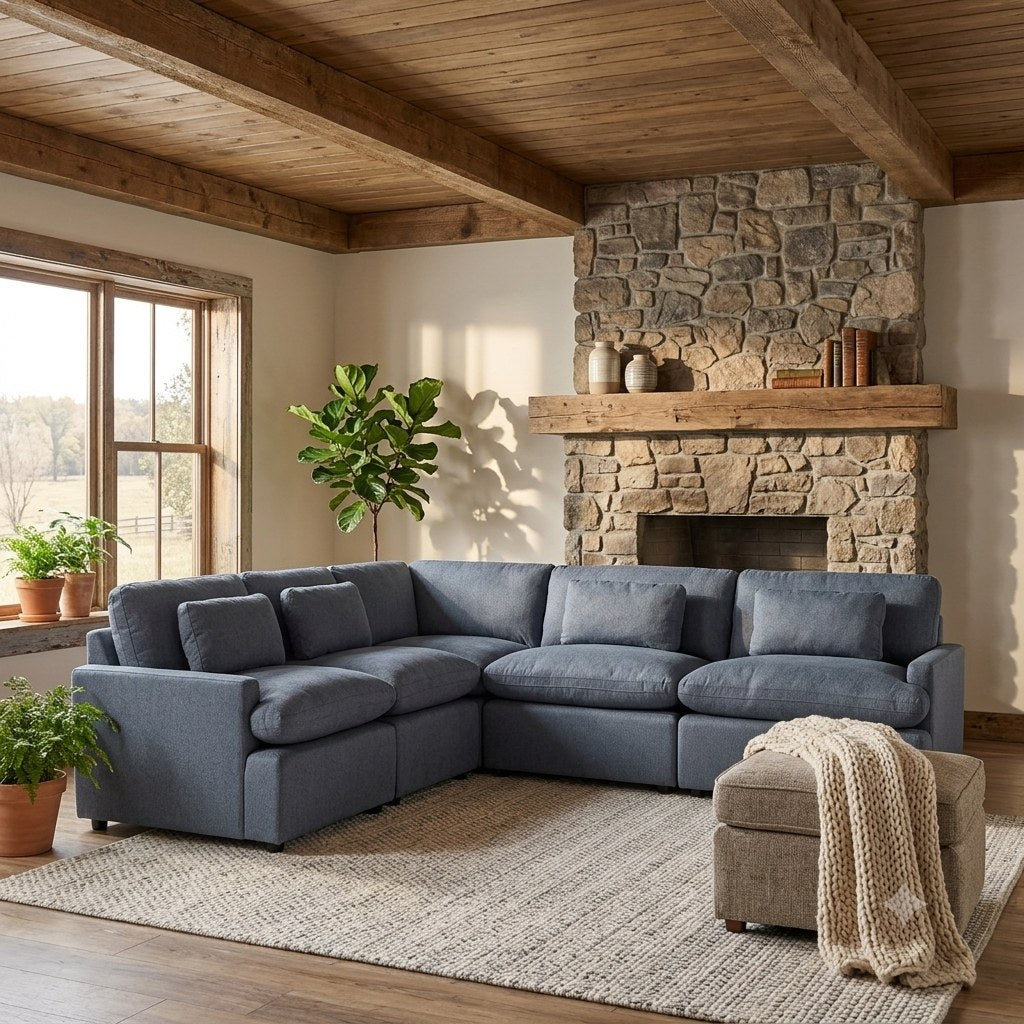 My Cloud modular sectional in Slate Blue staged in a rustic lodge with stone fireplace
