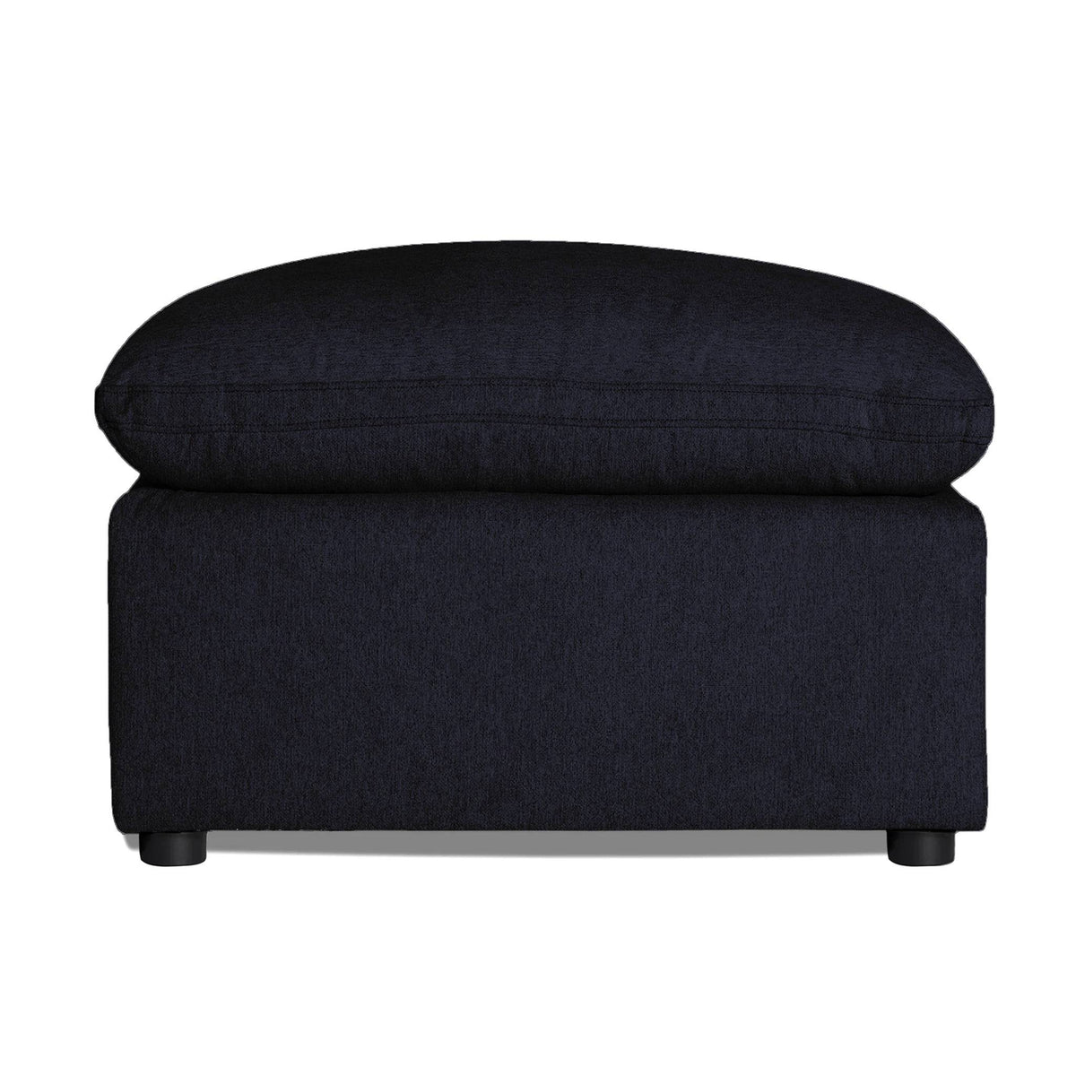 My Cloud 30 inch Ottoman in Slate Blue styled beside a sofa in a cozy living room