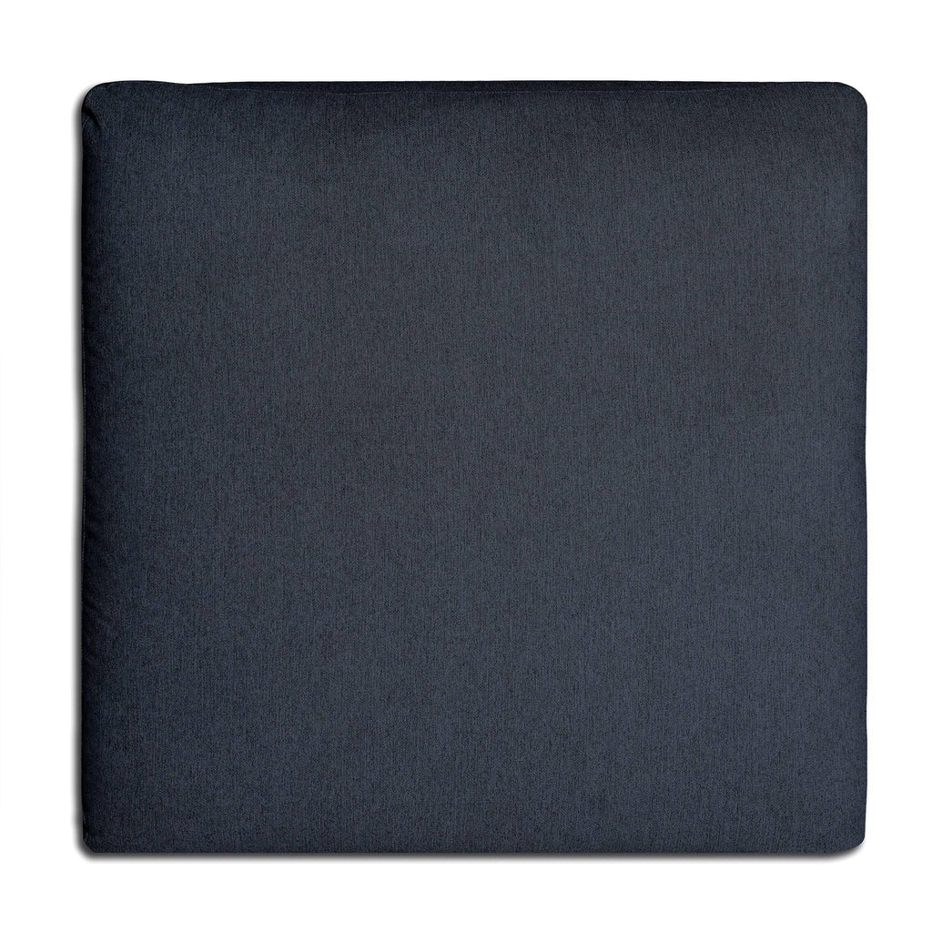 A dark grey, rectangular My Cloud 40 Ottoman is displayed on a white background. Its smooth, soft surface exudes luxurious comfort. The rounded corners enhance its minimalist design, making it an elegant addition to any furniture collection.