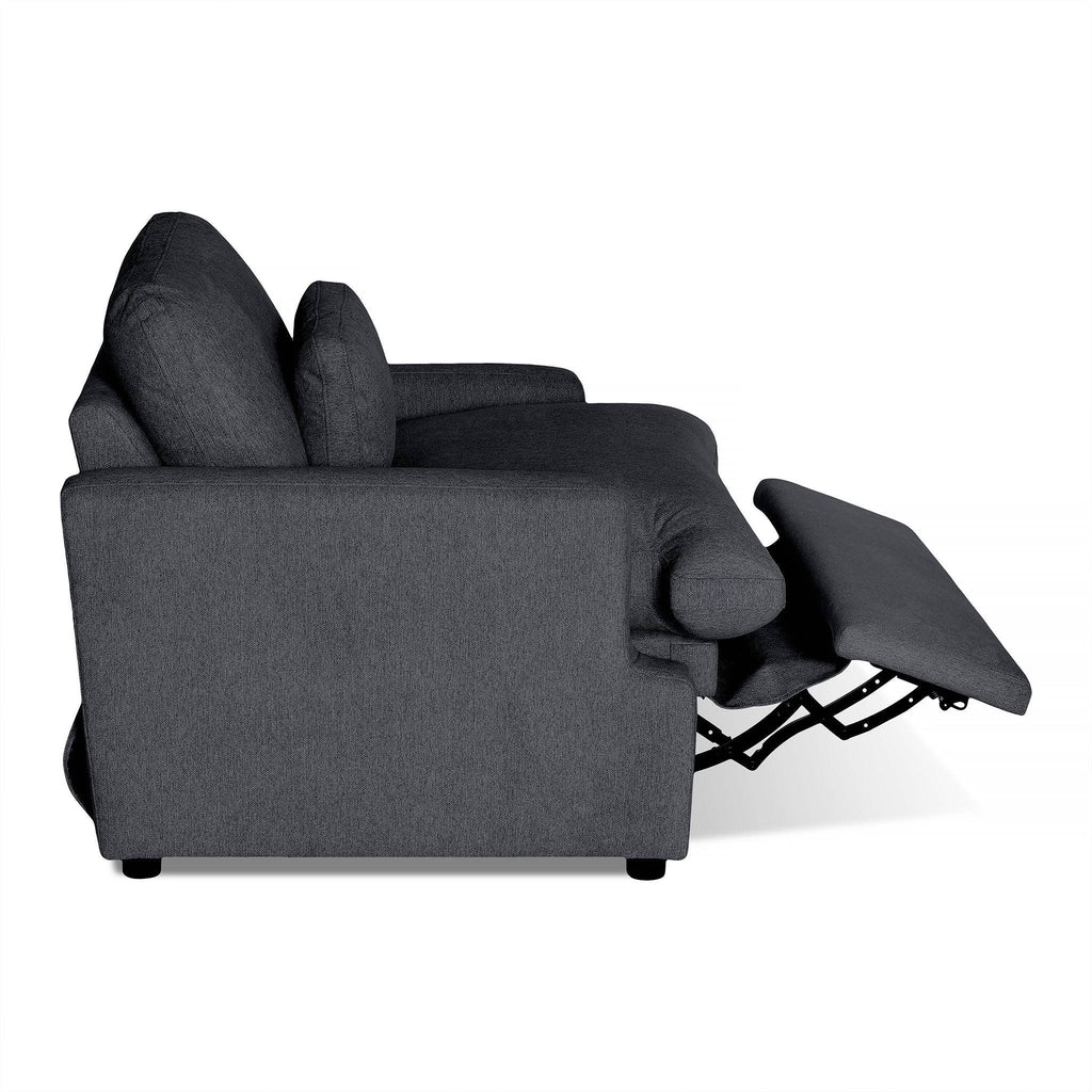Side view of the My Cloud Power Recliner in dark gray, showcasing an extended footrest. It features cushioned armrests, a plush backrest for added comfort, and a visible footrest mechanism beneath the seat for customizable relaxation.