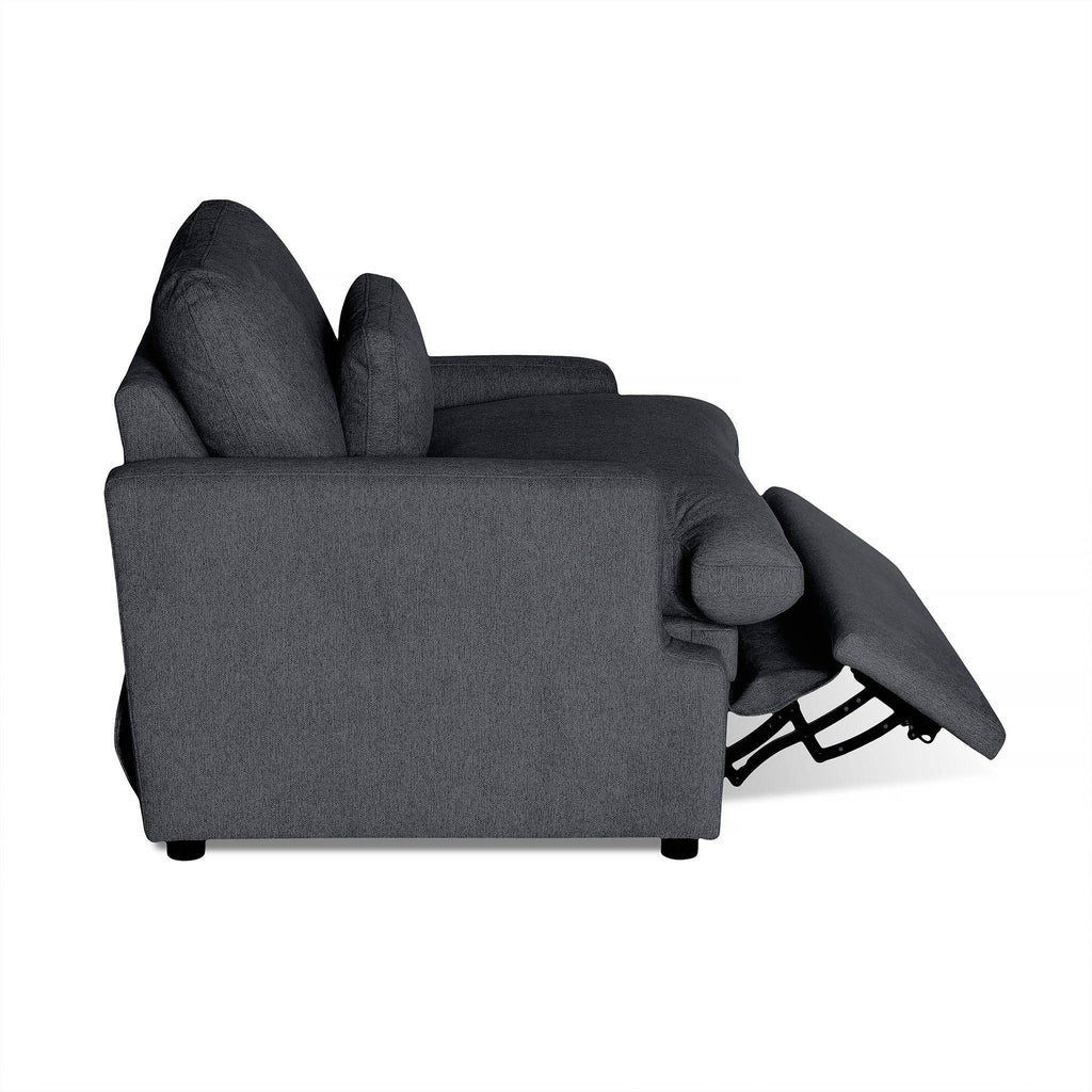 Side view of a dark gray My Cloud Power Recliner with a partially extended footrest, plush cushions, and an armrest. The modern design highlights customizable furniture for ultimate comfort.